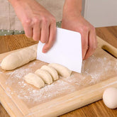 Raspador de masa de plástico